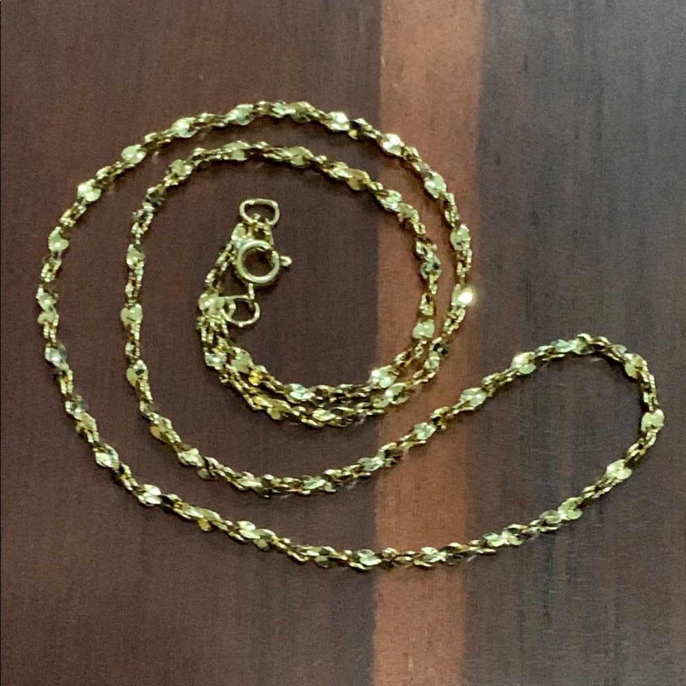 Gold tone textured necklace
